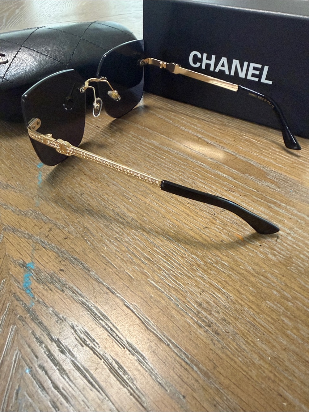 CHANEL Rimless Square Sunglasses in Black and Gold Accents - Picture 8 of 10